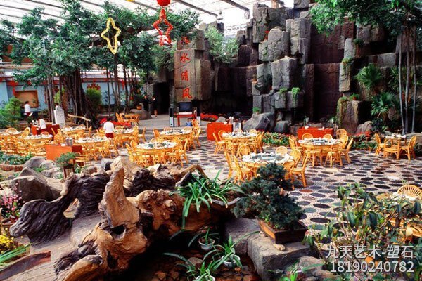 生态餐厅塑石假山造景图片